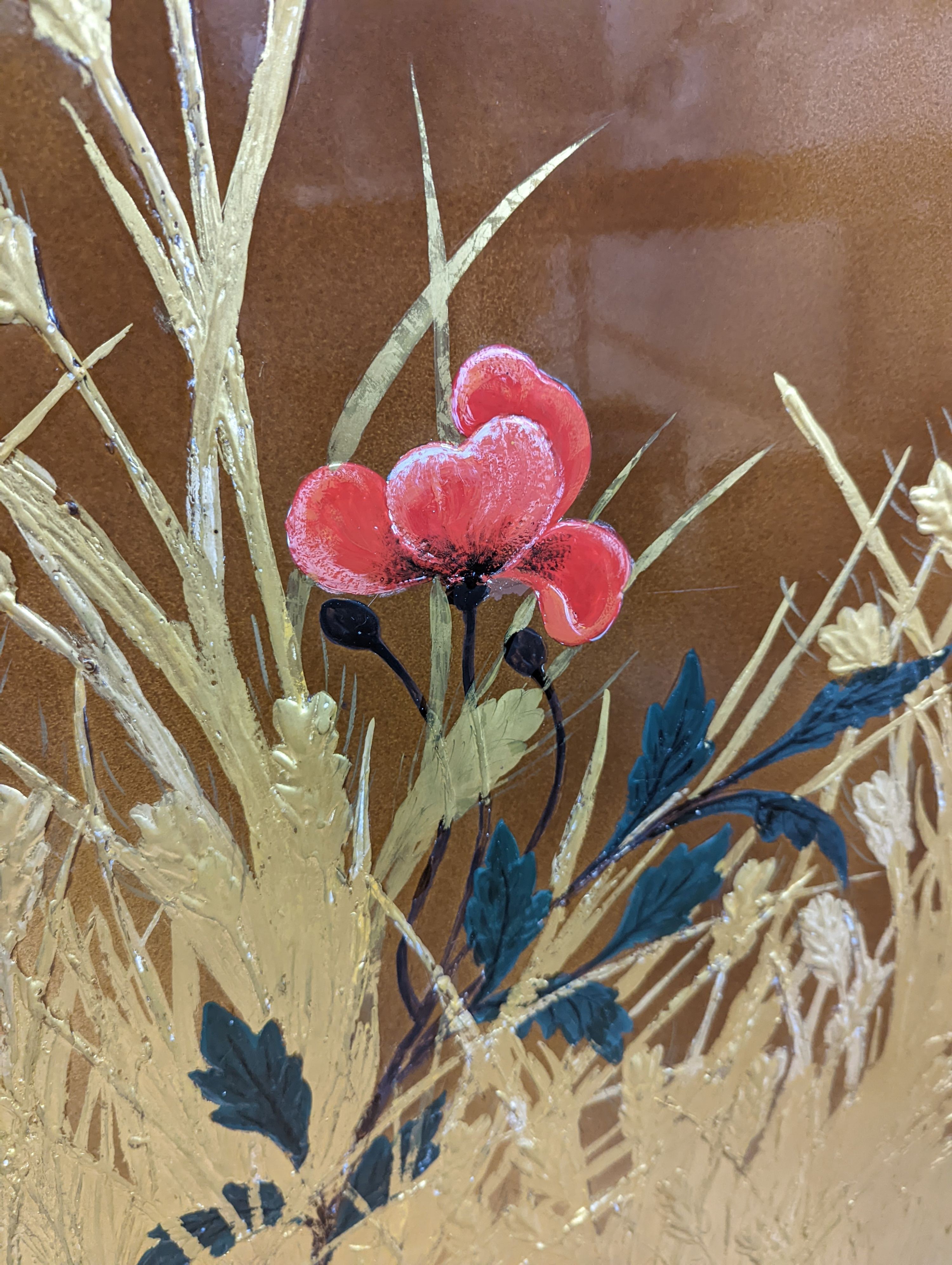 A large lacquer panel of rose amongst gilt painted corn, signed, Midcour dated, ‘79. 110cms high x 160cms wide